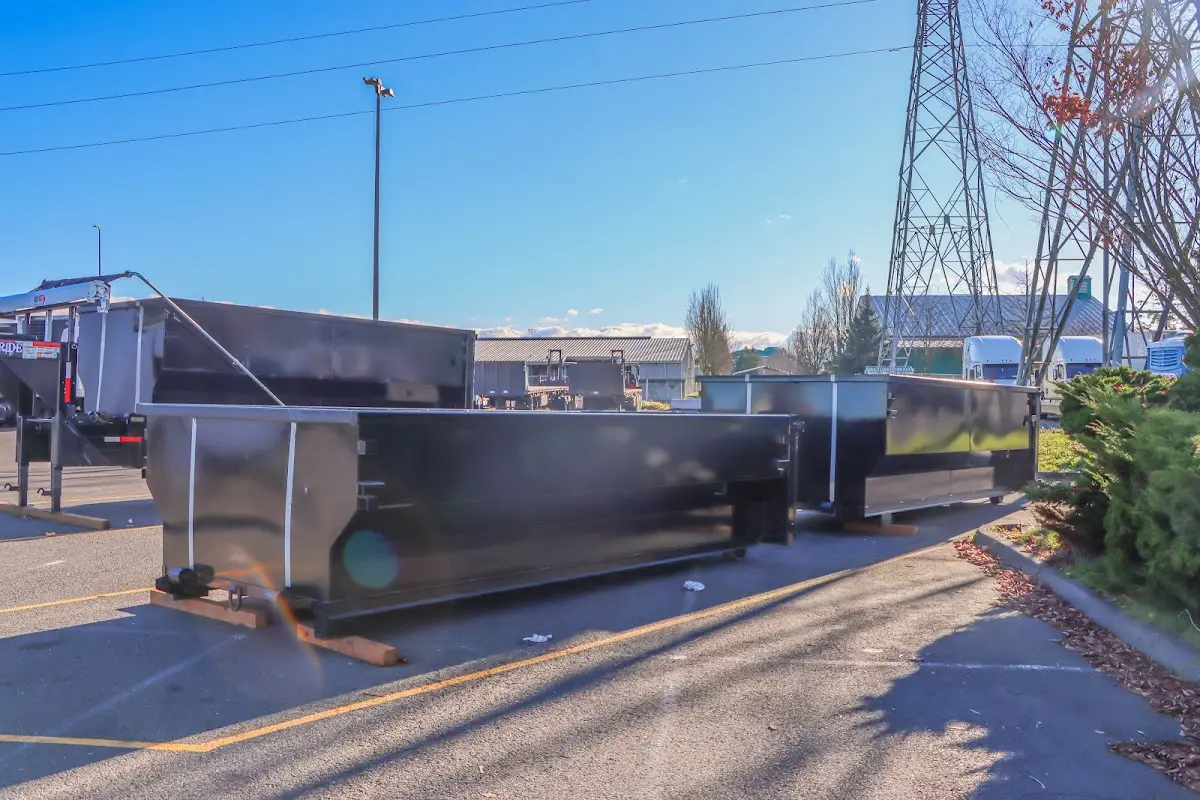 Roll-off dumpster ready for waste disposal at job site for 15 Yard Dumpster Rental in The Colony